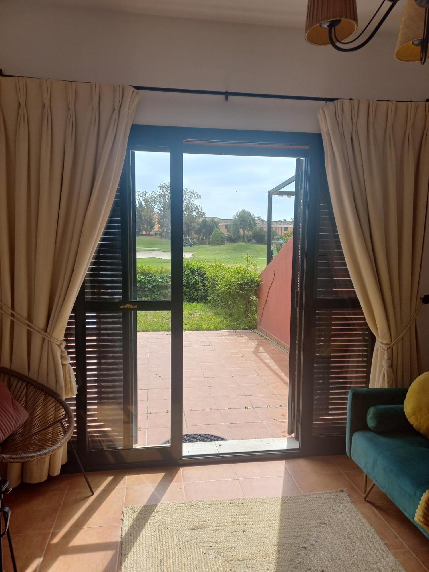 Olhando Um Campo De Golf Islantilla Dış mekan fotoğraf